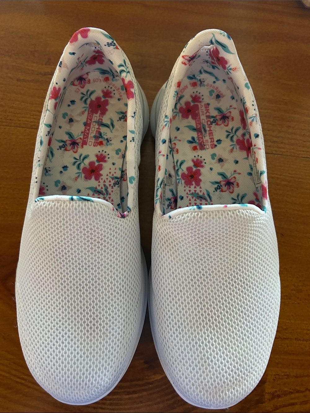 Skechers Women's White Slip-On Sneakers with Floral Insole